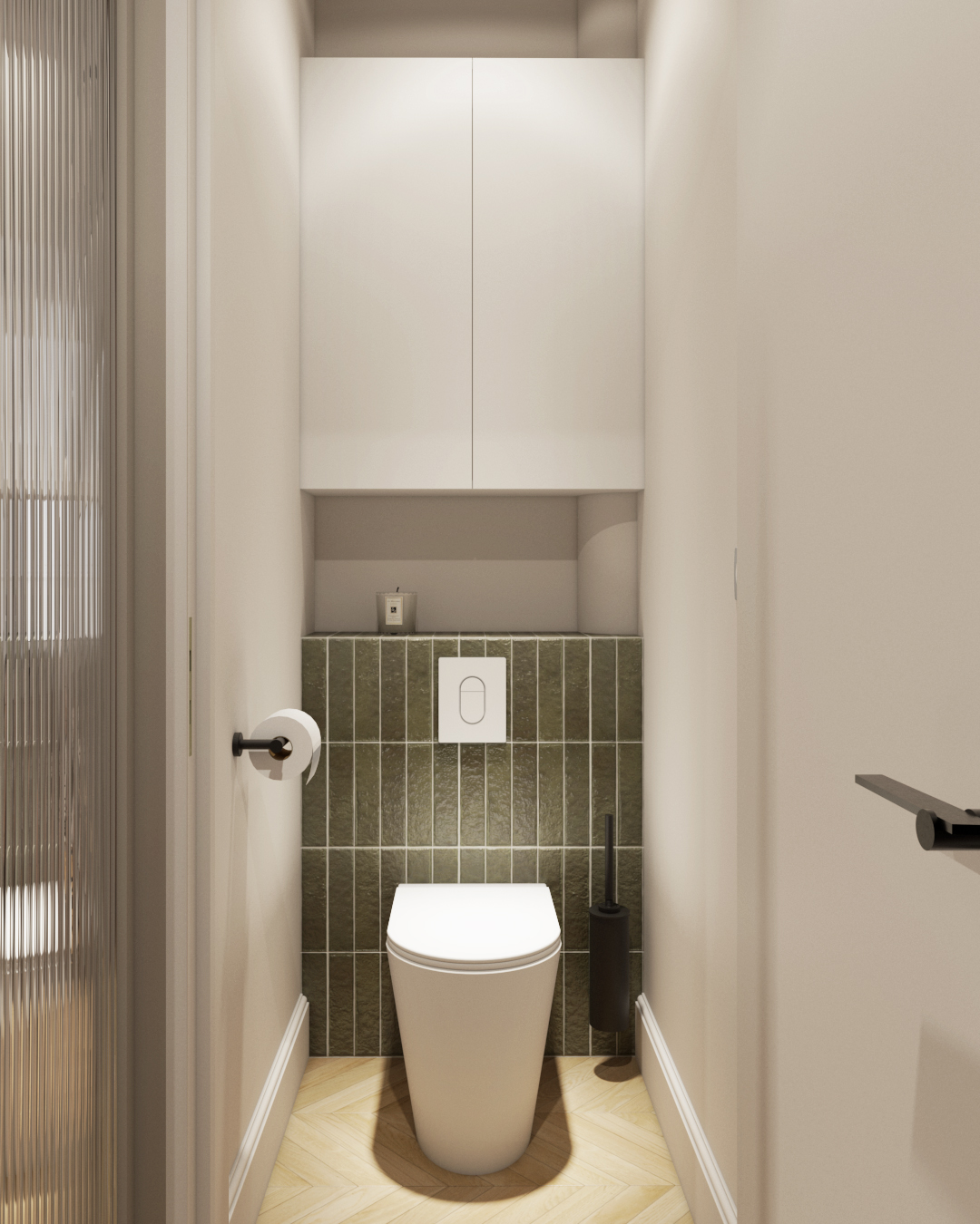 WC décorés de zelliges verts, avec des touches de bois et de blanc.